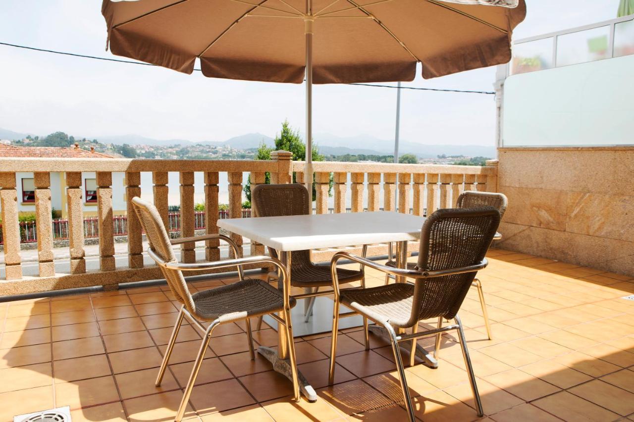 Apartamentos Ria De Bayona Baiona Bagian luar foto