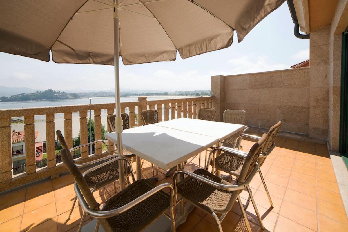 Apartamentos Ria De Bayona Baiona Bagian luar foto