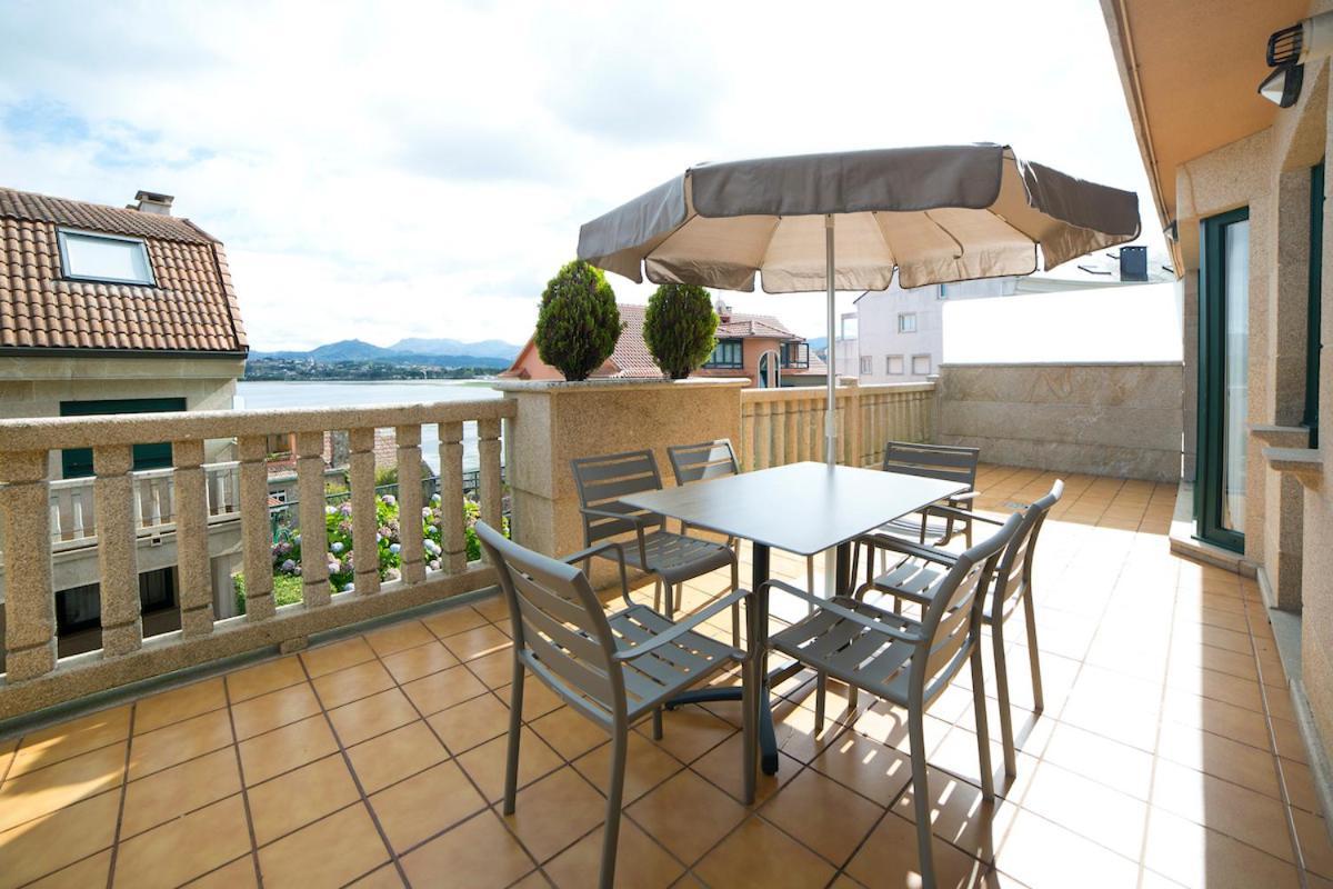 Apartamentos Ria De Bayona Baiona Bagian luar foto